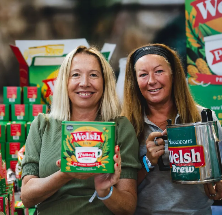 Ladies holding Welsh Brew Tea