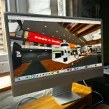Young man designing graphic on computer 